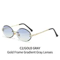 Gafas de sol ovaladas sin montura con marco de metal dorado y lentes grises degradados - Montura Dorada Lentes Degradadas Grises