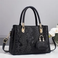 Elegant black snakeskin textured handbag with gold hardware and detachable shoulder strap - L28 W13 H20 / Black