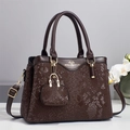 Elegant dark brown snake-print handbag with adjustable strap and small coin purse - Coffee
