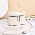 Minimalist cream textured crossbody bag with silver hardware and double zipper closure - White