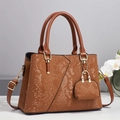 Elegant brown snakeskin embossed handbag with golden hardware and adjustable shoulder strap - Earthy Yellow