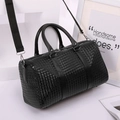 Large black woven leather travel bag with dual handles and adjustable shoulder strap - No Shoe Compartment / Small (18L) / Black