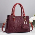 Elegant wine red snakeskin embossed handbag with gold hardware and V-stitch design - Red