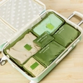 Set de 6 organisateurs de voyage étanches vert olive dans une valise vert clair - Vert