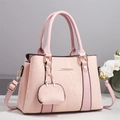 Pink snakeskin pattern handbag with gold hardware and a matching mini charm pendant - Pink