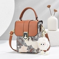 Chic quilted crossbody bag with brown leather flap and stylish paisley fabric pattern - Earthy Yellow
