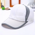 Detail of white mesh baseball cap featuring hexagonal breathable fabric and reflective trim - White