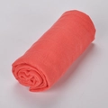 Pink cotton linen scarf rolled up showing soft breathable fabric texture and solid color - Watermelon Red