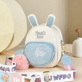 Women's faux leather backpack with bunny ear design and colorful cartoon strap - Beige with Blue