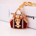 Creative handbag-shaped keychain with deep red enamel and sparkling rhinestones - Red