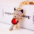 Golden cat keychain pendant with red crystal gemstone and white rhinestones - Red Black