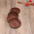 Set of four round black walnut wood coasters with natural grain on a wooden table - Black Walnut Round Groove Diameter 8.8cm