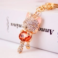 Exquisite gold fox keychain with amber gemstone and sparkling crystal rhinestones - Peach