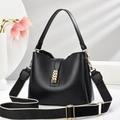 Classic black leather handbag with lychee texture and adjustable wide woven strap - Black