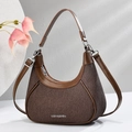 Dark brown pleated hobo bag with adjustable strap shown in a professional studio setting - Coffee