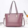 Dettaglio borsa shopper viola con finiture dorate e trama in ecopelle di alta qualità - Viola