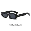 Modische schwarze Oval-Sonnenbrille mit goldenen Nieten und dunkelgrauen Gläsern - Schwarzer Rahmen Schwarz Graue Gläser