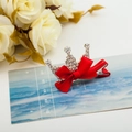 Sparkling crystal crown hair clip featuring a vibrant red satin bow with silver alloy base - Triangle Crown Red