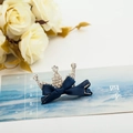 Crystal crown hair clip with navy blue satin bow and rhinestones on a card - Triangle Crown Navy Blue
