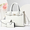 Detailed view of 3-piece white crocodile pattern handbag set with golden hardware - White