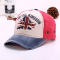 Detail of vintage baseball cap featuring Union Jack embroidery and metal star rivets - Denim Blue Brim & Watermelon Red