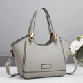 Borsa a mano grigia in pelle con finiture dorate e tracolla rimovibile, design elegante - Grigio