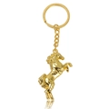 Close-up of golden metal horse keychain featuring a dynamic jumping pose and polished finish - Running Horse Gold