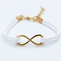 Minimalist white faux leather bracelet with gold infinity symbol and lobster clasp - Infinity Suede Cord Style / White