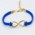 Fashionable gold infinity symbol bracelet with royal blue faux leather cord - Infinity Suede Cord Style / Blue
