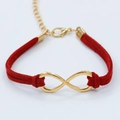 Red velvet rope bracelet with golden infinity symbol charm and lobster clasp closure - Infinity Suede Cord Style / Red