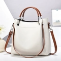 Chic beige lychee grain leather bucket bag with brown handles and adjustable strap - Off White