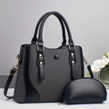 Borsa a mano a righe nere e grigie con manico rotondo e piccola pochette coordinata - Nero