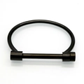 Minimalist black stainless steel horseshoe bangle with gold-plated D-shackles - Black