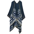 Close-up of deep blue knitted poncho showing geometric texture and yellow edge stitching - Ethnic Grey