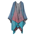 Detail of V-neck knitted poncho featuring split hem and teal-burgundy gradient weave - Gradient Blue