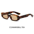 Modische ovale Sonnenbrille mit Schildpatt-Rahmen, Teegläsern und Goldakzenten - Schildpatt Rahmen Champagner Linsen