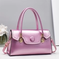 Metallic pink patent leather handbag with gold hardware and adjustable shoulder strap - Purple