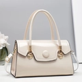 Elegant cream patent leather handbag with gold shell hardware and wavy flap design - Off-white