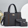 Schwarzes Taschenset mit goldener Hardware und braunem Lederbesatz im eleganten Design - Schwarz