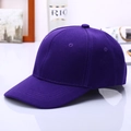 Detail view of deep purple cotton baseball cap with six-panel design and curved brim - Purple