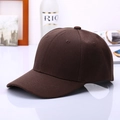 Detail view of a dark brown six-panel cotton baseball cap with embroidered eyelets - Coffee