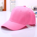 Close-up of pink cotton baseball cap with six-panel design and embroidered eyelets - Pink