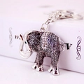 Portachiavi a forma di elefante con cristalli e finitura argento su libro bianco - 10.7x5.4CM / Argento