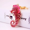 Porte-clés hippocampe élégant en or rose avec strass roses et grand cristal scintillant - Rose