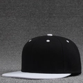 Classic black and white contrast color snapback baseball cap with a flat brim design - Grey Brim + Black
