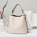 Elegante borsa a secchiello in pelle crema con manico e tracolla regolabile - Bianco Sporco