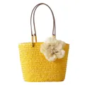 Handwoven yellow straw tote bag with large white floral accent and brown straps - Yellow