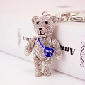 Sparkly silver rhinestone teddy bear keychain with a blue heart-shaped mini bag charm - Blue Heart Bag Style / Blue