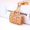 Creative beige enamel handbag keychain with heart patterns and sparkling rhinestones - Coffee