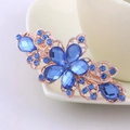 Elegant gold hair clip featuring a large blue crystal flower design for thick hair - Sapphire Blue